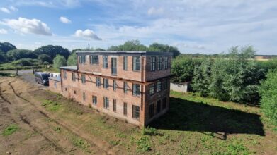 BALCONIES | Custom Balcony Fabrication Lincolnshire - On-Site Welding Services in Lincolnshire Large brick building structure in rural Lincolnshire, completed with professional on site welding by Lincolnshire Site Weld and Fabrication
